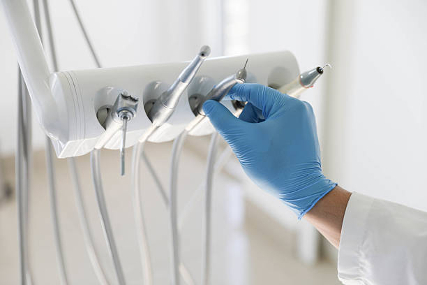 Professional Tooth Extraction technician working in Kenosha, WI